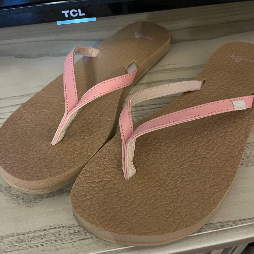 Pink Sanuk Flip Flops size 9